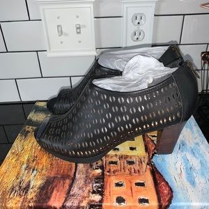 NWT - black leather peep toe heels .